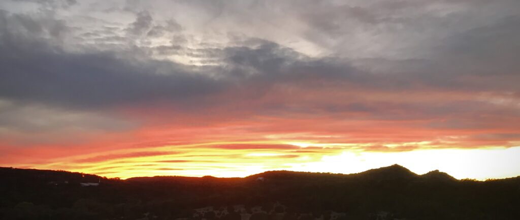 Texas hill country sunset over Triple Peak